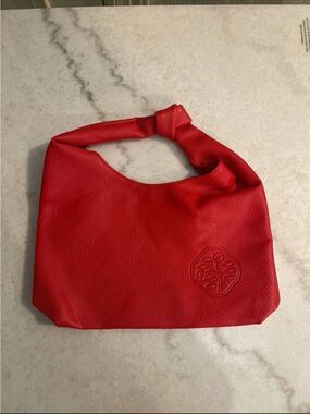 Dainty Vegan leather hand bag Cle De Peau